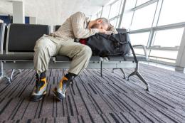 Airport traveller sleeping