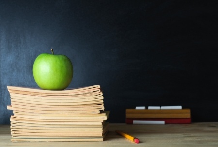 Apple on teacher's desk