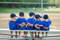 Boys on a baseball bench