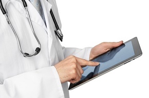 Doctor with tablet