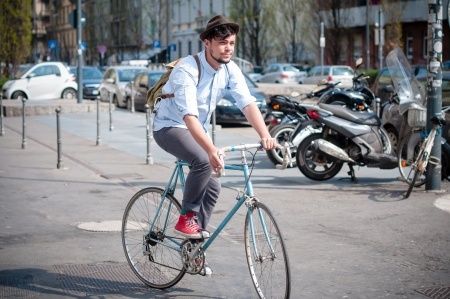 Hipster on a bike - he liked Dynamics CRM Spring 2015 before it was cool